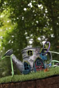 watering can fairy house