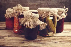 Mason jars with burlap and twine on the tops