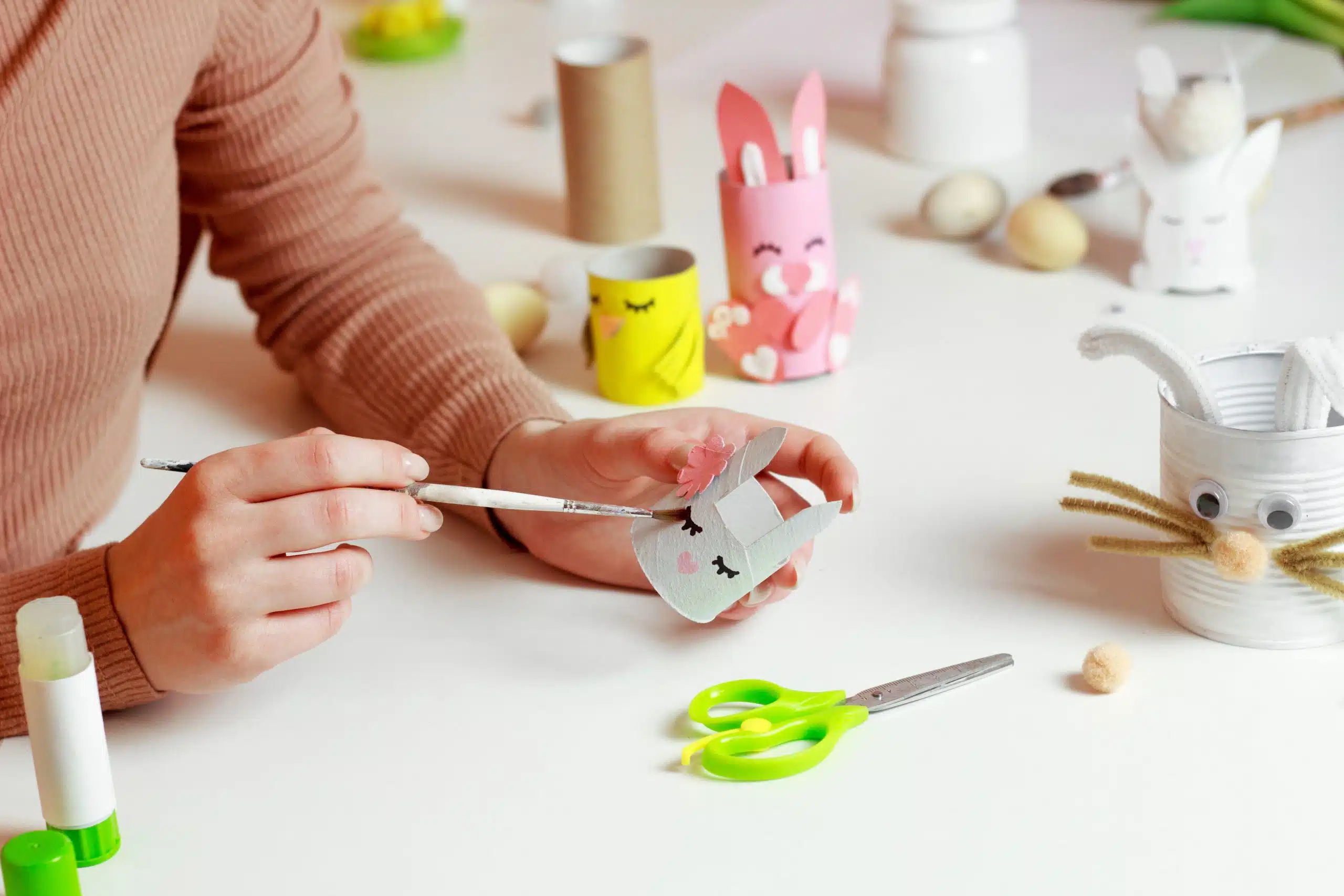 Reuse concept art from toilet tube. Eco friendly bunny craft. Handmade decoration easter rabbit. Kids DIY ideas.