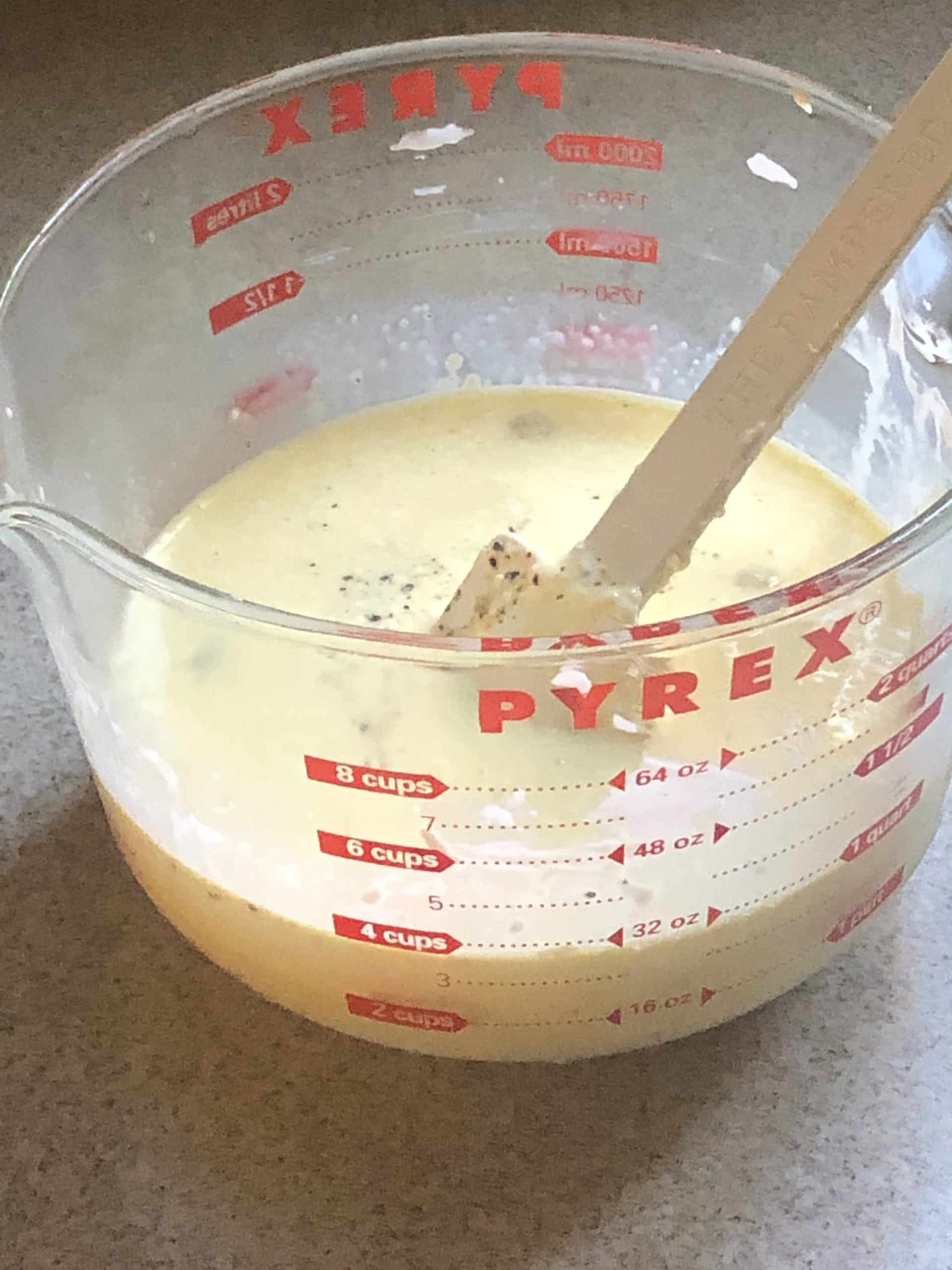eggs whisked in pyrex dish for quiche