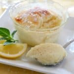 lemon pudding cake in small glass serving dish