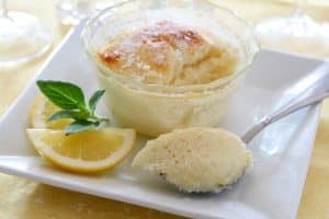lemon pudding cake in small glass serving dish