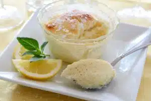 lemon pudding cake in small glass serving dish