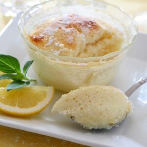 lemon pudding cake in small glass serving dish