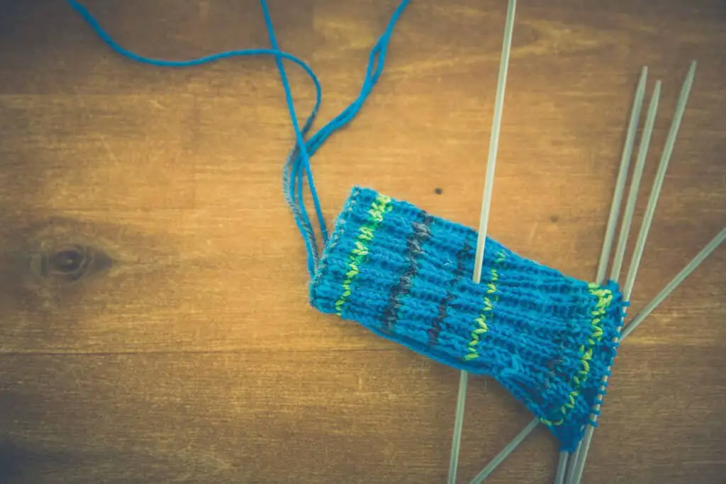 teal yarn with yellow and blue stripes for knit socks
