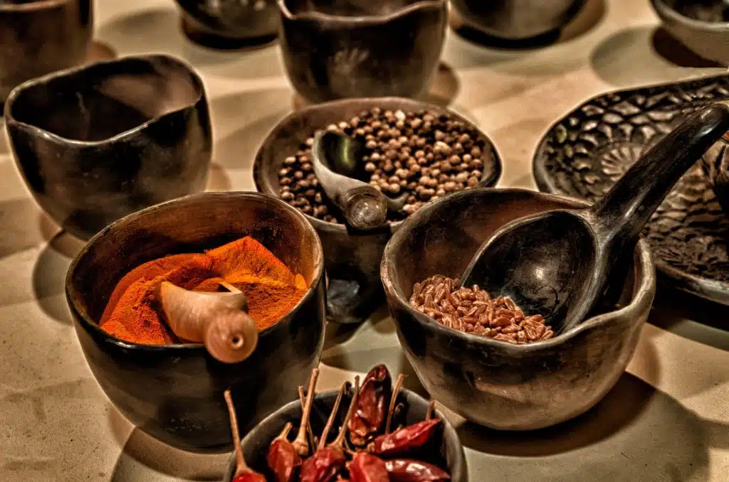 spices in wooden bowls for diy spice blends